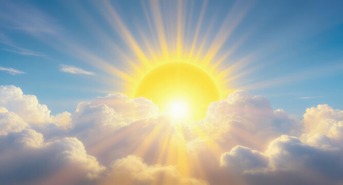 Bright sunburst with yellow rays shining through fluffy clouds in blue sky