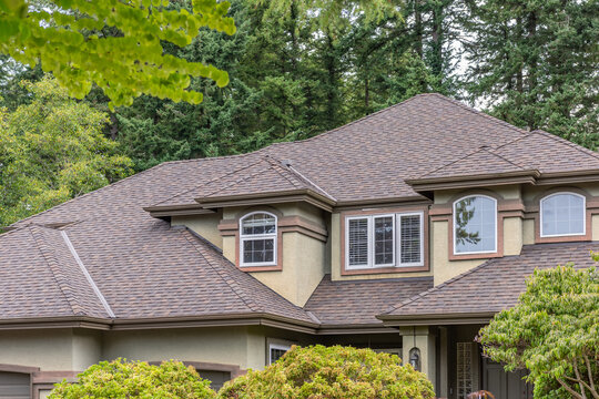 op of luxury house with shingle roof and nice windows in Summer in Vancouver, Canada, North America. Day time on August 2025.