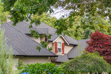 op of luxury house with shingle roof and nice windows in Summer in Vancouver, Canada, North...