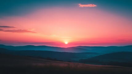 Fototapeta premium Vivid sunset over mountain range