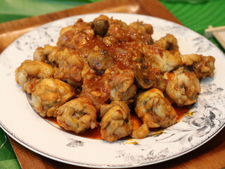 Stir-fried chicken with barbecue sauce — tender chicken pieces cooked in a sweet and smoky BBQ sauce, perfect for a flavorful and quick meal.