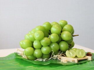 Simuska grapes — a variety of table grapes known for their large, juicy berries with a sweet and slightly tart flavor. These grapes have a vibrant dark purple to black skin and are commonly enjoyed fr