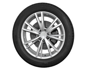 Obraz premium Sleek modern alloy wheel and tire assembly for automotive performance and style upgrades