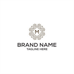 Initial letter M serif font logo design, green leaves nature graphic icon concept