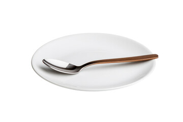 Elegant Spoon and Plate: A polished spoon gracefully rests upon a clean, minimalist plate, offering a visually appealing image of culinary simplicity and dining refinement.