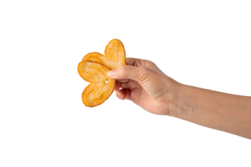 Heart shaped sugared crackers in hand on transparent background