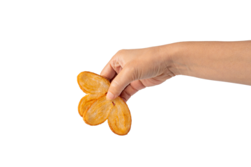 Heart shaped sugared crackers in hand on transparent background
