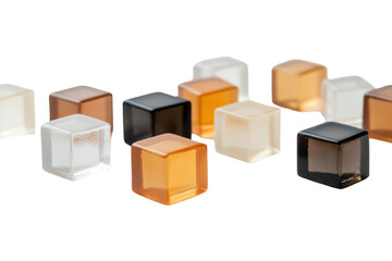 Translucent Cubes of Varying Hues: A striking studio shot featuring an assortment of geometrically perfect cubes in a spectrum of translucent shades, with each cube casting subtle shadows