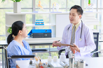 Fototapeta premium Asian male doctor in white coat with stethoscope, consulting explain medications to senior female patient professional support trust healthcare checkup, insurance treatment wellness in hospital 