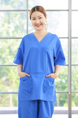 Portrait asian happy cheerful woman caregiver nurse workers for medical career growth with pride...