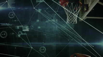 Athlete holding basketball and running through data lines dunking ball showing sports analytics - Powered by Adobe