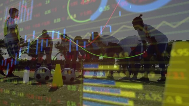 Female coach gesturing toward cones and balls initiating analytics overlays in soccer training - Powered by Adobe