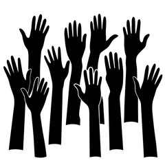 Many silhouetted hands raised in the air
