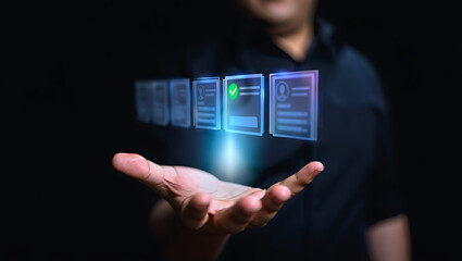Person holding digital profiles with checkmark human hand digital interface
