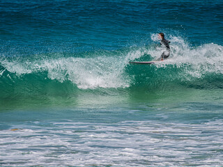 Surfer Cops A faceful Of Spray