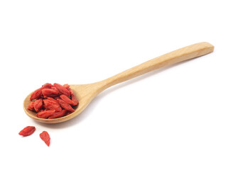 Dried goji berries in spoon isolated on white background