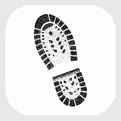 Fototapeta premium Bold footprint stamp design with worn texture, ideal for marketing campaigns about steps, progress, and journey themes in corporate or classroom settings 