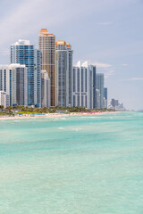 Modern skyline of Miami with towering skyscrapers, tropical vibe, and waterfront views
