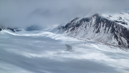 climbing mount kazbeg in georgia in summer