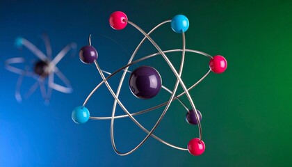 Stylized atomic structure with colorful nucleus and elliptical electron orbits.