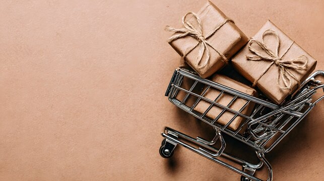 Two wrapped gifts in a miniature shopping cart on a brown background.