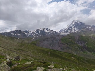 climbing mount kazbeg in georgia in summer