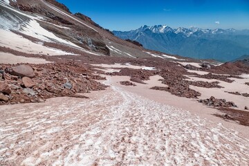 climbing mount kazbeg in georgia in summer