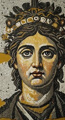 Close-Up of Fragmented Black, White, and Yellow Faces in Ancient Mosaic Portrait