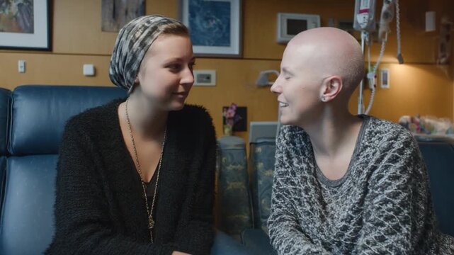 Empathy and Resilience: A heartwarming scene of two individuals, possibly a patient and her supporter, sharing a moment of connection, their faces conveying strength and support.