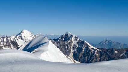 climbing mount kazbeg in georgia in summer