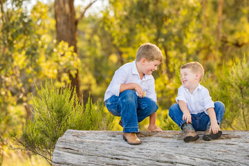 Fototapeta premium Country brothers playing together in Australian bush setting