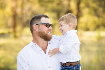 Obraz premium Father and son portrait in rural Australian bush setting