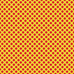 Red polka dots on a yellow background 