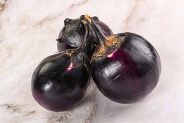 Raw violet and black eggplant