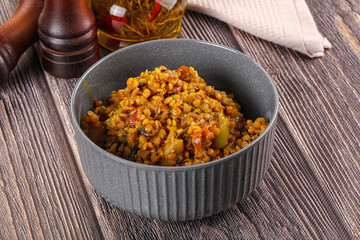 Fototapeta premium Vegan garnish - lentil with vegetables