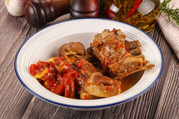 Baked lamb ribs with vegetables