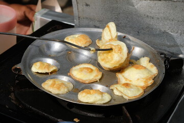 Telur puyuh goreng. Fried quail eggs. Children’s snack made from quail egg. Indonesian food 
