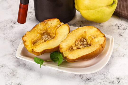 Baked quince with honey and cedar
