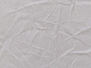 Crumpled white recycled craft paper texture with detailed surface. Cream paper. Crumpled white vintage paper surface texture. Paper background with copy space for text, suitable for design projects.