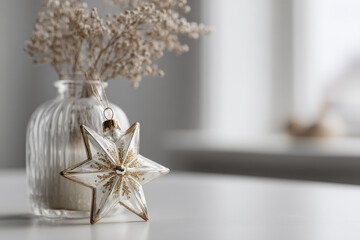 Fototapeta premium in festive setting for new year ultrabright starshaped christmas ornament stands out prominently