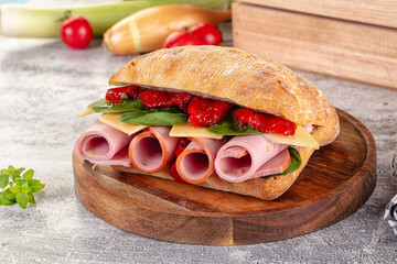 Ciabatta with mortadella, tomato, cheese and spinach