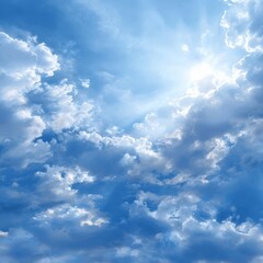 Obraz premium A beautiful blue sky filled with fluffy white clouds and the bright sun