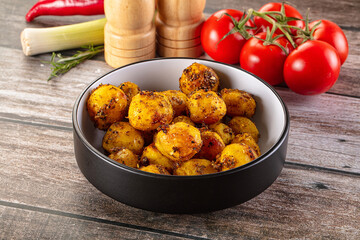 Baked small baby potato with herbs