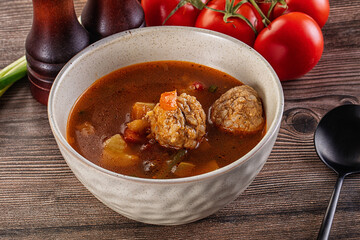 Tomato Soup with meatballs and vegetables