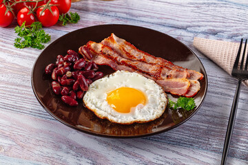 English breakfast with egg, bean and bacon