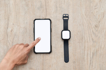 Connect your smartphone to your smartwatch , brown background