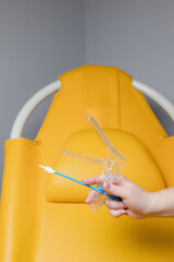 Gynecologist Holding Speculum and Cervical Brush