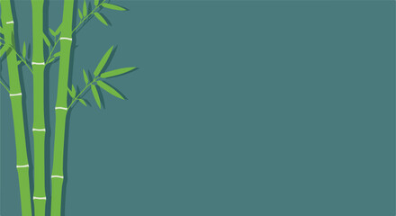Naklejka premium Bamboo stalks with leaves on a blue-green background
