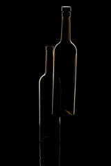 Still life with glass objects on a black background