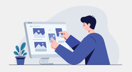 Person interacting with images on a computer monitor